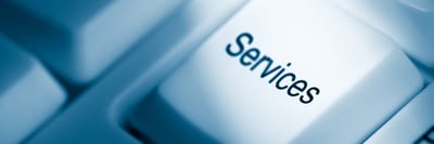 Närbild på tangentbordsknapp med texten ”Services”.